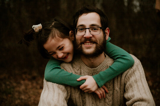 Father and daughter happy embracing