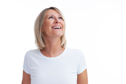 Picture of blonde woman over back isolated background making happy faces