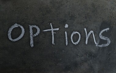Options Word Written on Blackboard with White Chalk in Horizontal Orientation