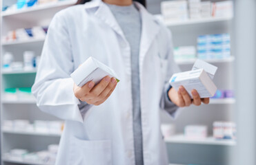Pharmacist, pills and medicine with hands of woman in store for healthcare, wellness and retail....