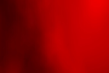 Red defocused abstract smooth asymmetric gradient background