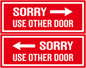 Door sign in red color that says : sorry use other door 