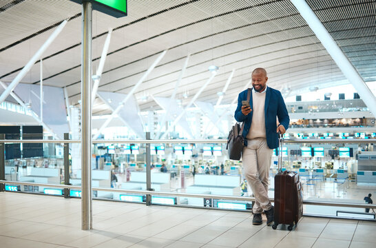 Black man standing in airport, smile and phone with online flight schedule or visa application for business trip. Global travel, technology and happy businessman checking international destination.