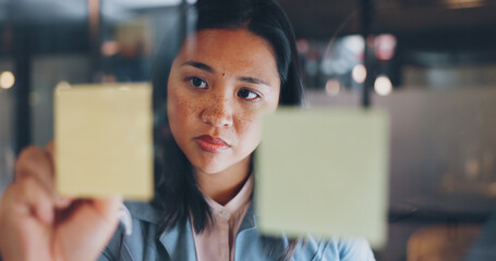 Sticky note, writing or woman planning a strategy for financial, sales or business growth in an...