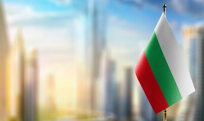 Small flags of the Bulgaria on an abstract blurry background