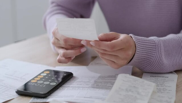 economical woman work on phone calculator at home pay bills taxes on gadget online, provident female calculate finances expenditures, manage plan family household budget on phone.