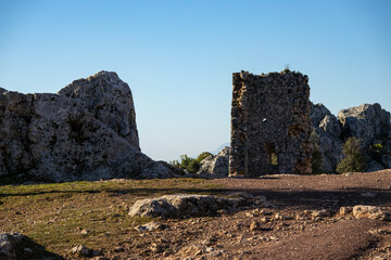 
The remains of ancient fortifications creating a gate with a view into the distance