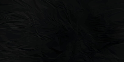 Black paper texture . Dark black wrinkled paper texture. Black crumpled paper texture . black crumpled and top view textures can be used for background of text or any contents .