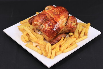 Fast Food Meal of Grilled Whole Chicken with French Fries on Serving Plate  Food Photos