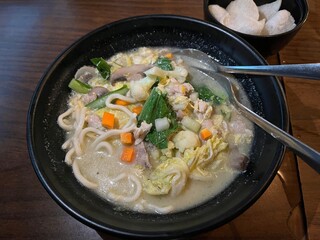 Bakmi Godhog which is boiled noodles cooked with spices, meat and broth. Typical of Javanese cuisine.