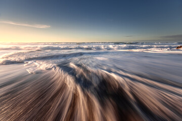 Waves reaching Ilbarritz beach at Biarritz, Basque Country.