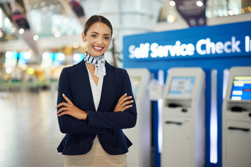 Woman, passenger assistant and arms crossed at airport by self service check in station for...