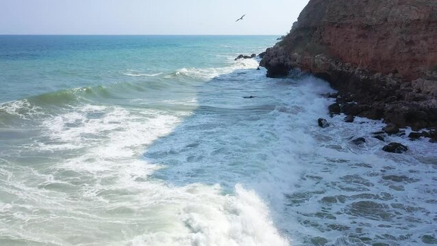 Aerial view to a beautiful wild rocky beach and big waves, Black Sea, Bulgaria