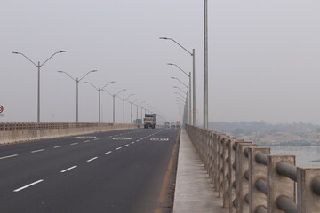 Transport safety concept. Traffic on the bridge. highway bridge on the river in bangladesh