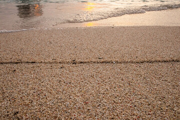 sandy beach textures and sun reflexion sunset