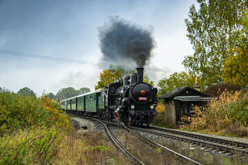 Fototapeta na wymiar Czech steam locomotive on a historic train