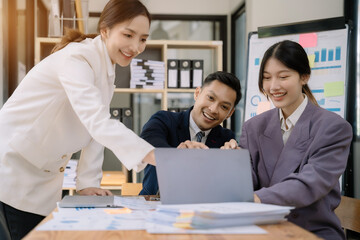 Asian business team present. professional investor working new start up project. tablet laptop computer with digital marketing media in the office.