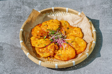 Kimchijeon, Korean Kimchi Pancake food : Slices of well-fermented kimchi mixed into a flour batter and pan- fried. Finely chopped pork, squid, and clam meat may be added to the batter as well.