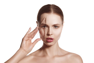 Fototapeta premium Making beauty, modifying face to make non-surgical or surgical correction, plastic surgery. correction of asymmetry. Young woman, female patient isolated on white studio background. Lifting concept