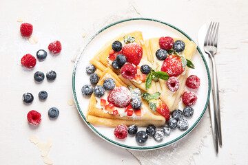 Healthy breakfast, homemade traditional crepes or pancakes