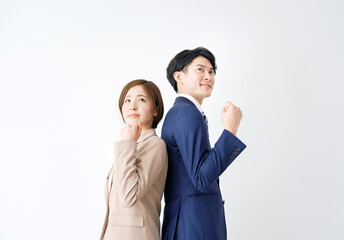 ガッツポーズするビジネスウーマンとビジネスマン　白背景