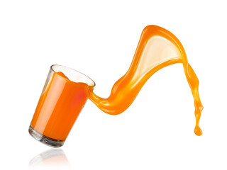 Carrot juice splash from a glass