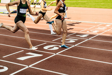finish line women sprint race in athletics competition - obrazy, fototapety, plakaty