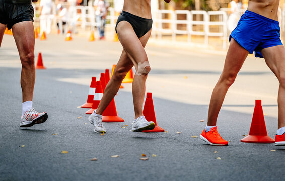 group athletes male and female racewalking