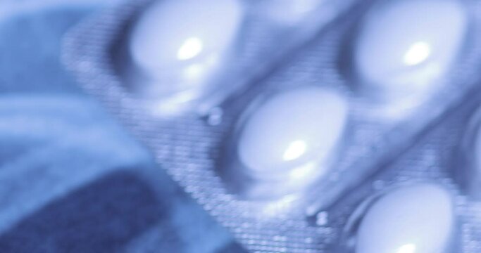 X-ray image and blister pack of white tablets