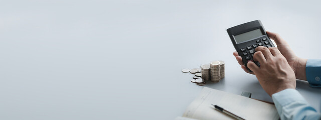 Person with stack of coins, saving money concept for future use and financial stability, savings...