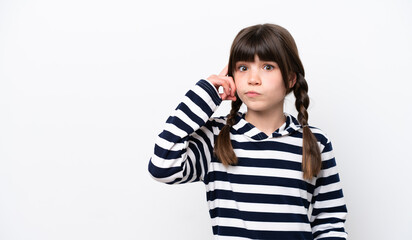 Little caucasian girl isolated on white background thinking an idea