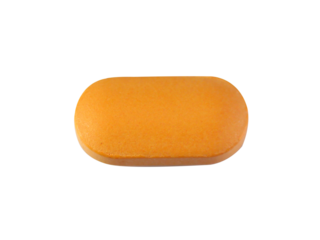 one orange pill isolated on white background.