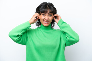 Young Argentinian woman isolated on white background frustrated and covering ears