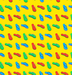 Green, blue and red tsinelas (flip-flops) grid pattern on a yellow background