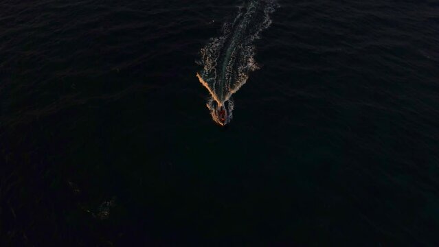 training of children on sailing boats optimist in Mediterranean sea