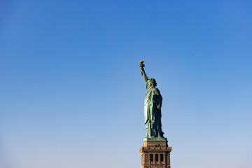 Fototapeta na wymiar Statue of Liberty, blue sky