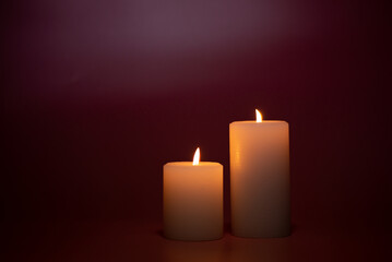 ピンクの背景とキャンドル