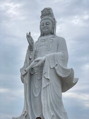 Fototapeta na wymiar Statue of Buddha in sky background Giant Buddha Statue