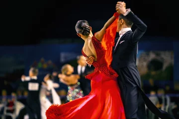 Gordijnen сouple dancers man and woman waltz dancing in competition © sports photos