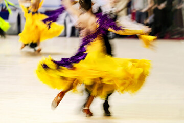 ballroom dancing couple dancers on blurry motion competition