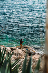 person on the pier fishermen