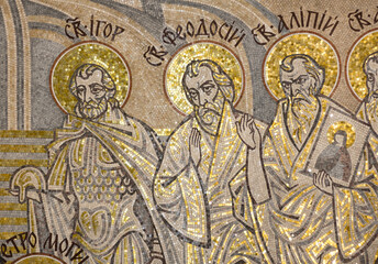Fototapeta na wymiar Beautiful golden mosaics with Christian saints