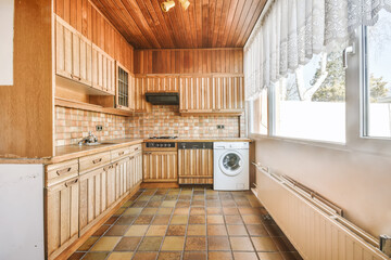 Small rustic kitchen with wooden furniture