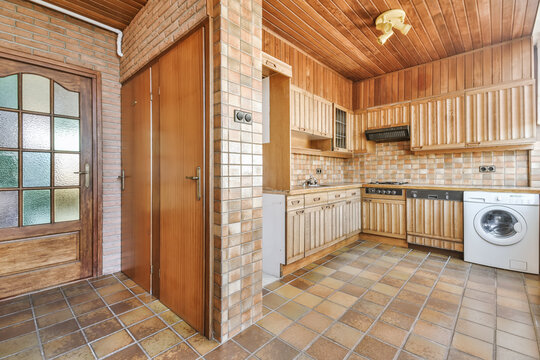 Small rustic kitchen with wooden furniture