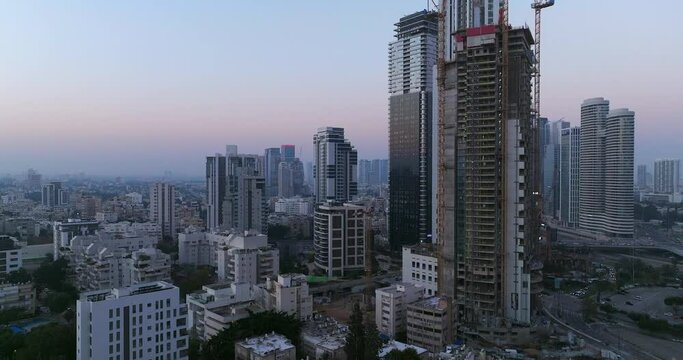Ramat Gan diamond district junction at sunrise with city skyscrapers