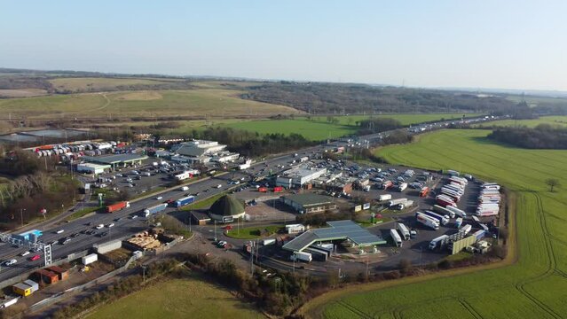 Aerial Footage of British Motorways with Traffic at Services Stop of Toddington Near to Luton Town of England UK. The Footage was Captured During The Day of 15 Feb 2023 with Drone's Camera