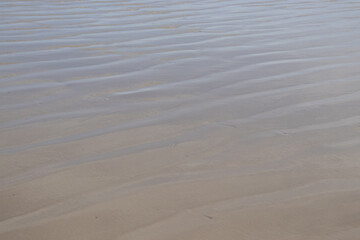 natural texture of sea waves and sand