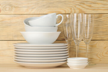 Tableware on a wooden background. Clean tableware.