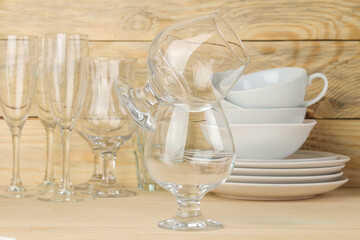 Tableware on a wooden background. Clean tableware.