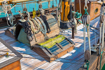 Old wooden boat moored on calm water